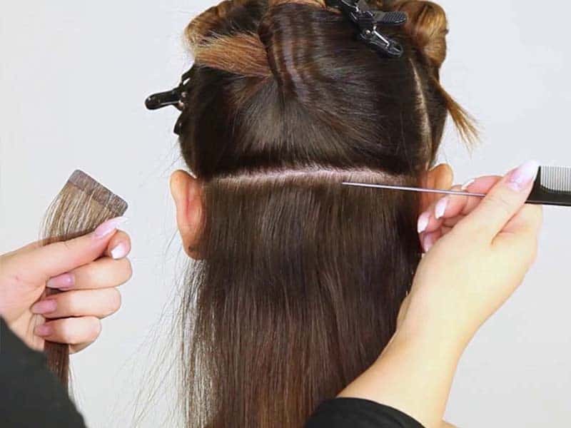 installing tape in hair extensions