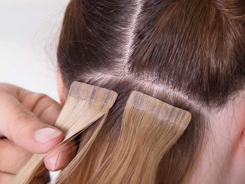 installing tape in hair extensions